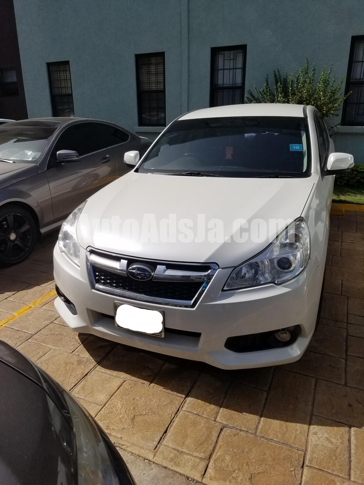 http://www.autoadsja.com/vehicleimages/29S593UD.jpg