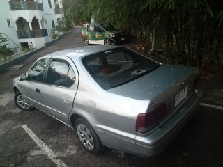 1996 Toyota Camry 
$290,000