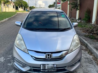 2015 Honda Fit Shuttle
$1,500,000