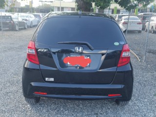 2013 Honda Fit 
$1,250,000